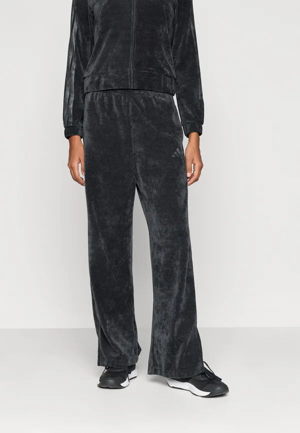 TIRO - Tracksuit bottoms - black