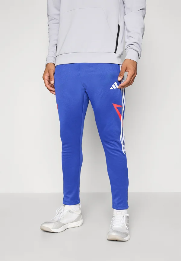 TIRO - Tracksuit bottoms - semi lucid blue/pure ruby/white