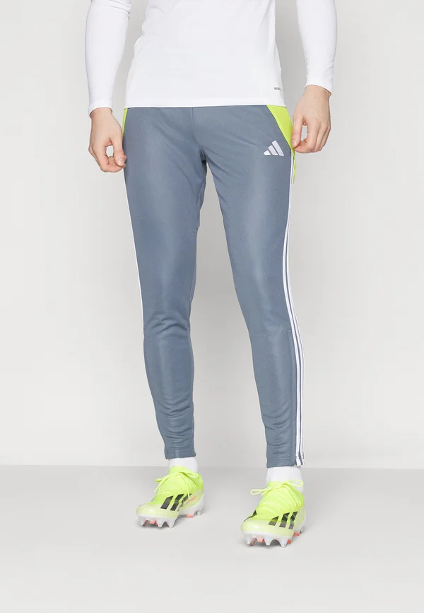 TIRO24 TRAINING PANT REGULAR - Tracksuit bottoms - team onix/team semi sol yellow