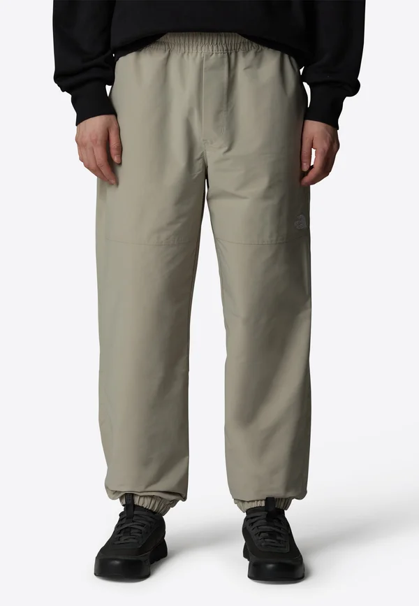 TNF EASWIND - Tracksuit bottoms - clay grey