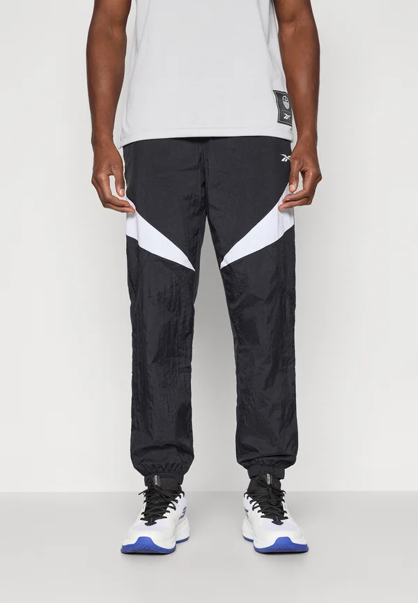 TRACK PANTS - Tracksuit bottoms - black