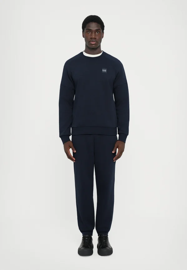 TRAIN VISIBILITY - Tracksuit - blue/cream