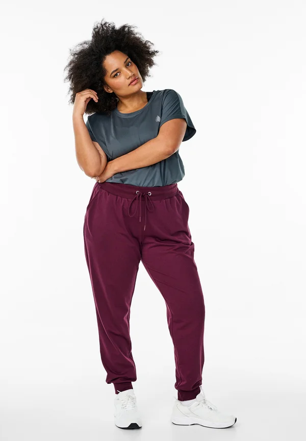 TRAINING MIT TASCHEN - Tracksuit bottoms - winetasting