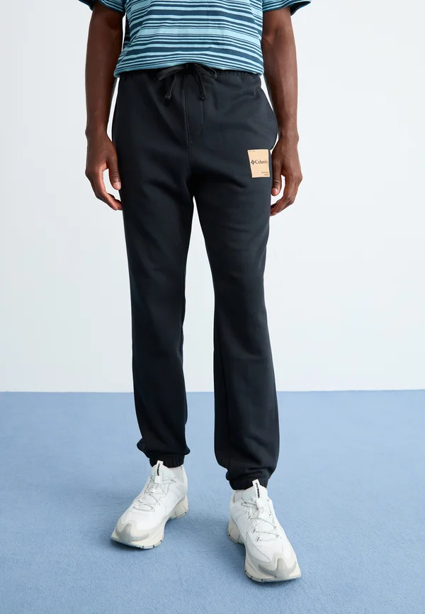 TREK™ - Tracksuit bottoms - black