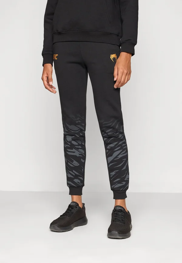 UFC FUSION WOMENS REPLIICA PANT CHAMPION - Tracksuit bottoms - black/gold