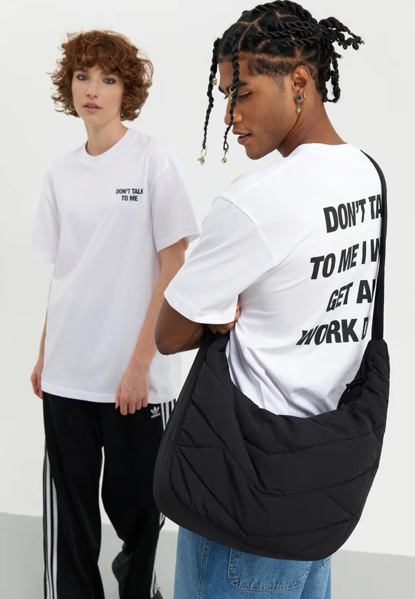 UNISEX - Cross body bag - black