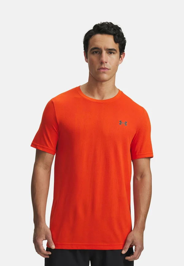 VANISH SEAMLESS - Sports T-shirt - orange base
