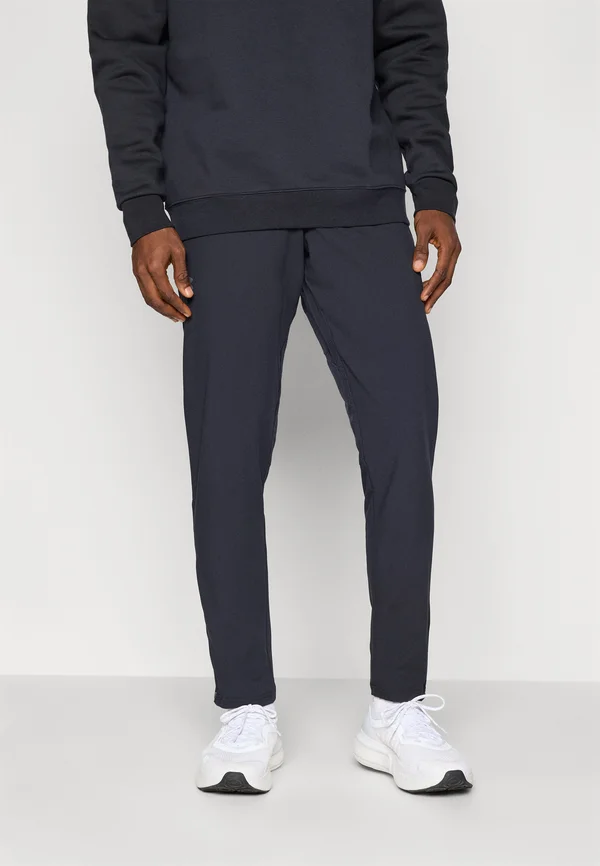 VANISH TAPERED PANTS - Tracksuit bottoms - black/castlerock