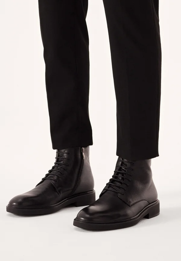 VEKUNUS - Lace-up ankle boots - black