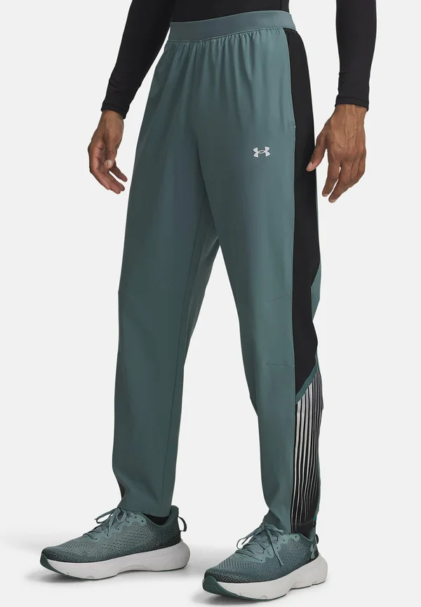 VELOCITI STORM - Tracksuit bottoms - jasper blue