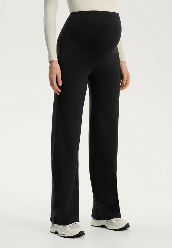WARM FLARE MATERNITY - Trousers - black