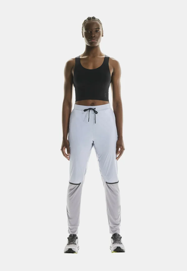 WEATHER - Tracksuit bottoms - nimbus/lilac