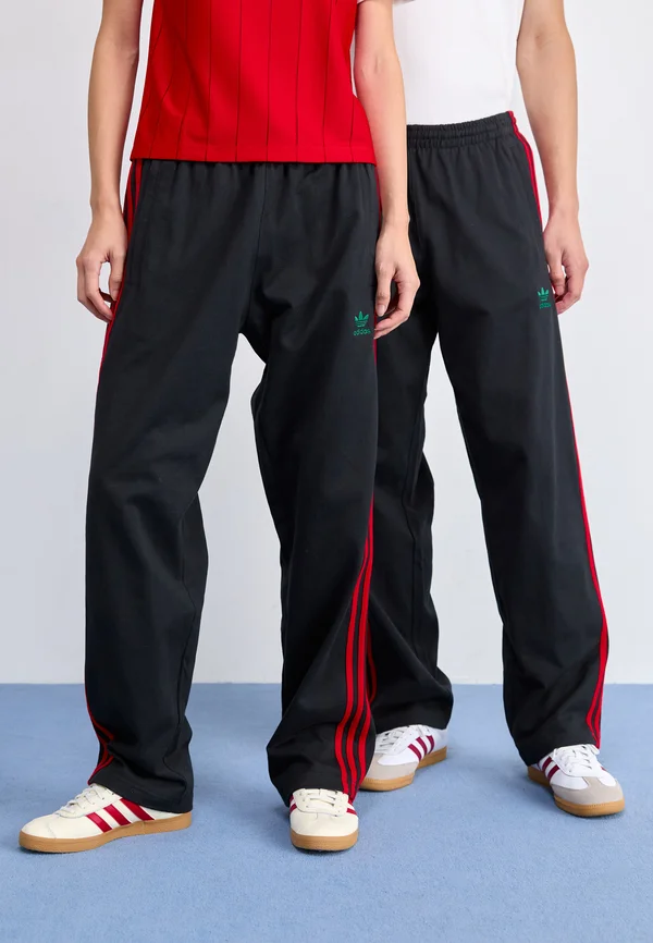 WIDE LEG UNISEX - Tracksuit bottoms - black/better scarlet