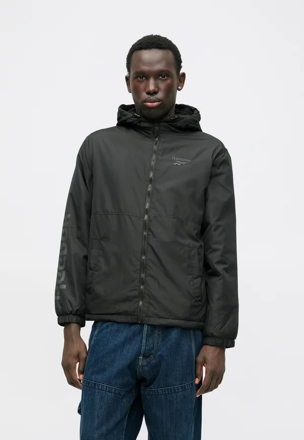 WINDBREAKER - Light jacket - black