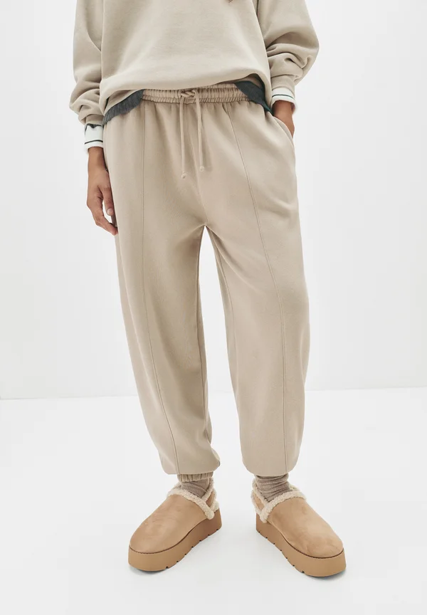WITH SEAMS - Tracksuit bottoms - sand