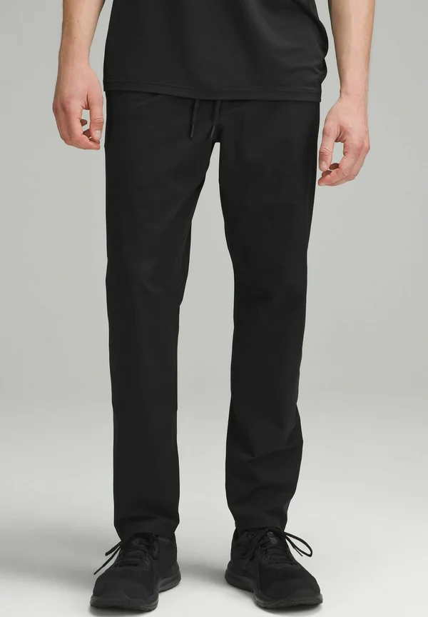 ZEROED IN SLIM-FIT PANT REGULAR - Tracksuit bottoms - black
